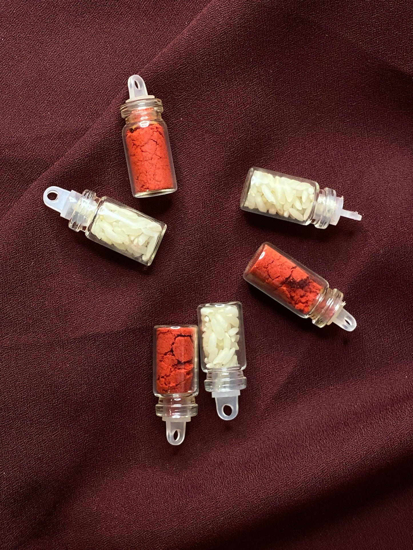 Rakhi Roli & Chawal Mini Bottles (25 Sets)